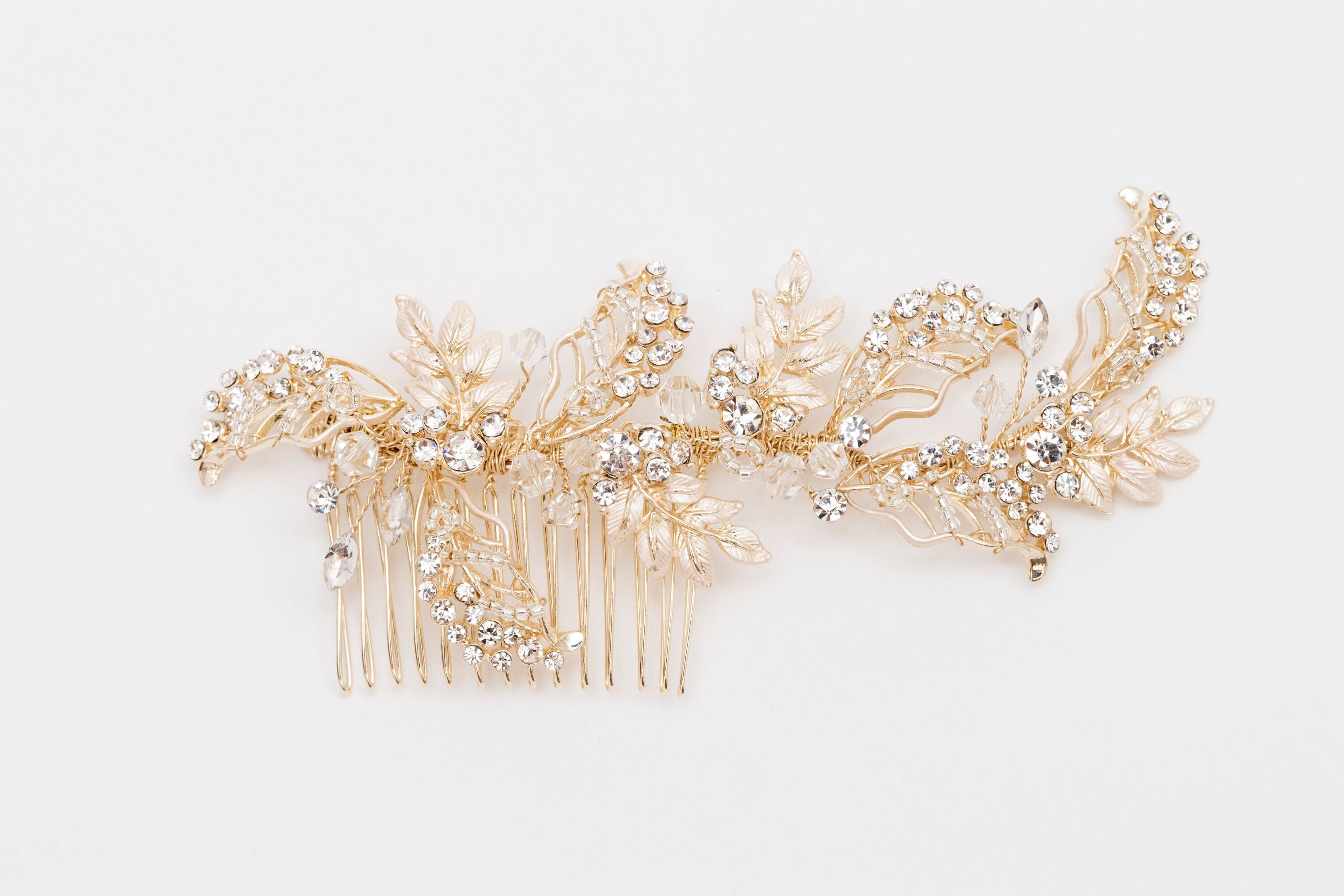 ivory knot-bridal hair combs-belle gold